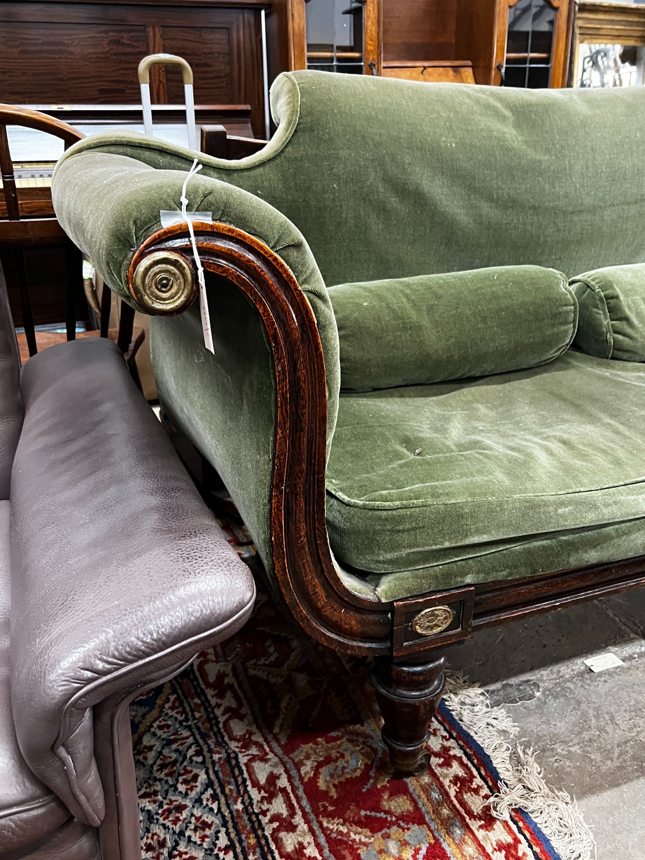 A Regency brass mounted simulated rosewood scroll arm settee, length 190cm, depth 68cm, height 95cm